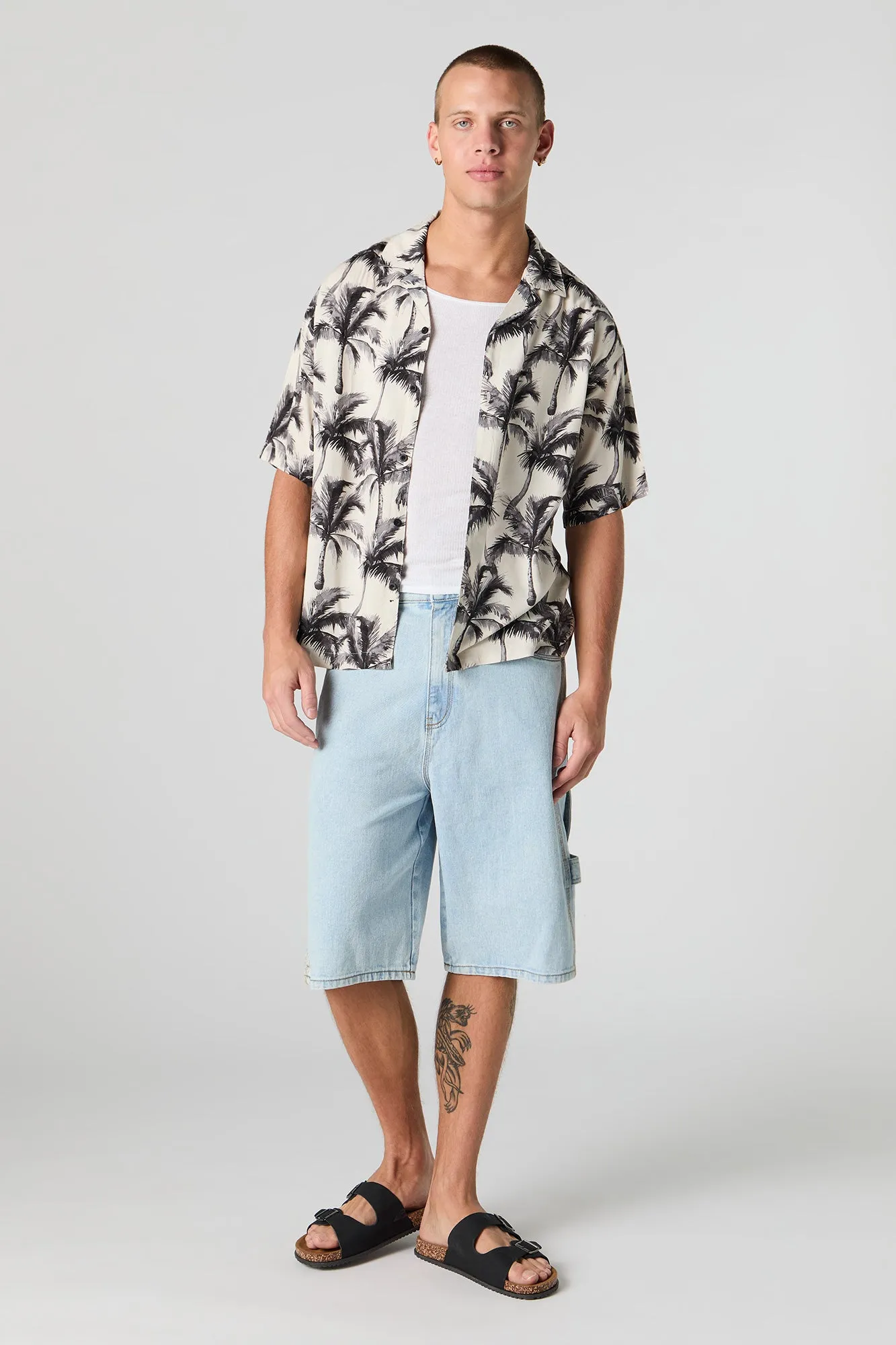 Haut boutonné à manches longues avec motif tropical