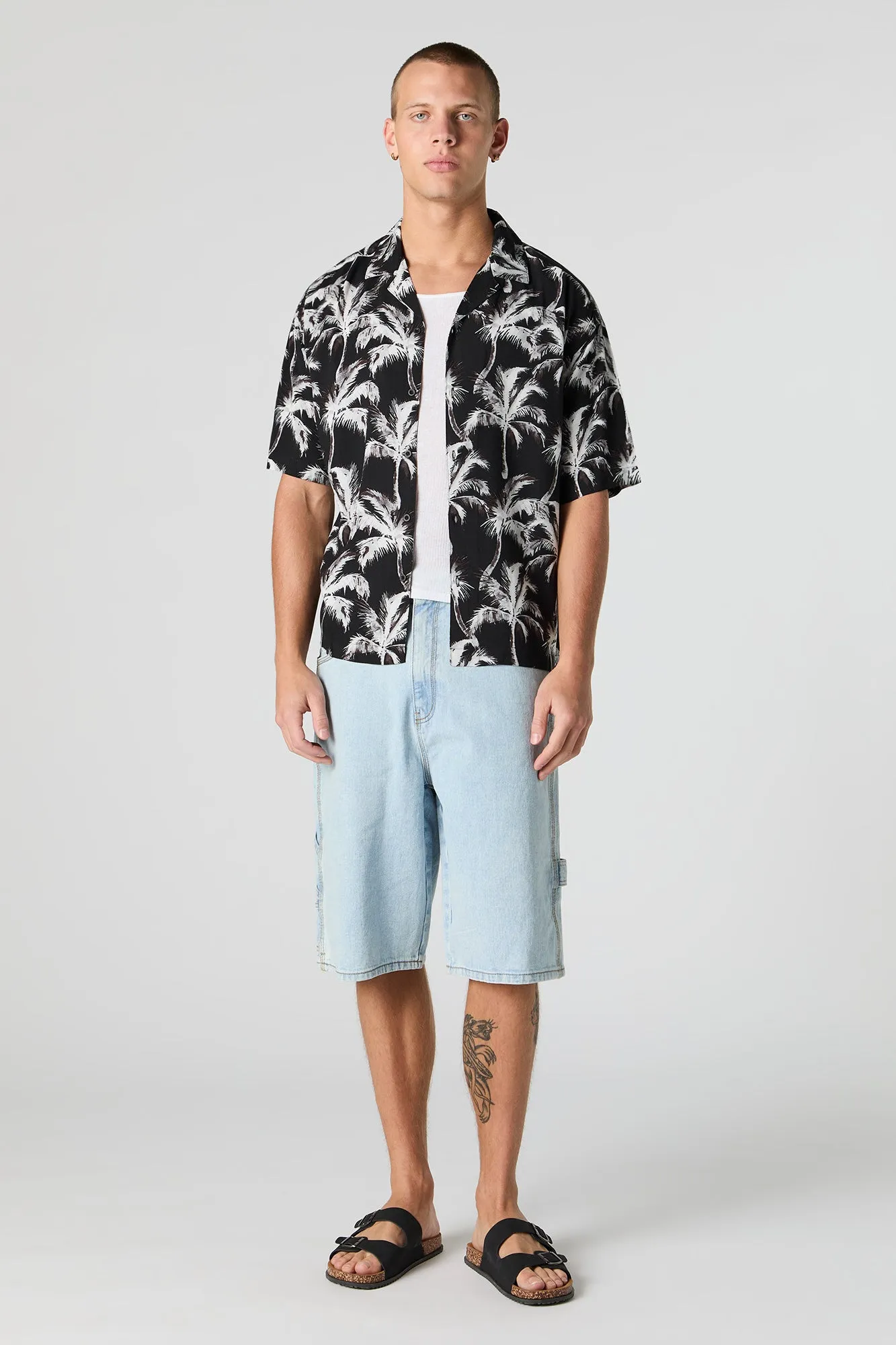 Haut boutonné à manches longues avec motif tropical